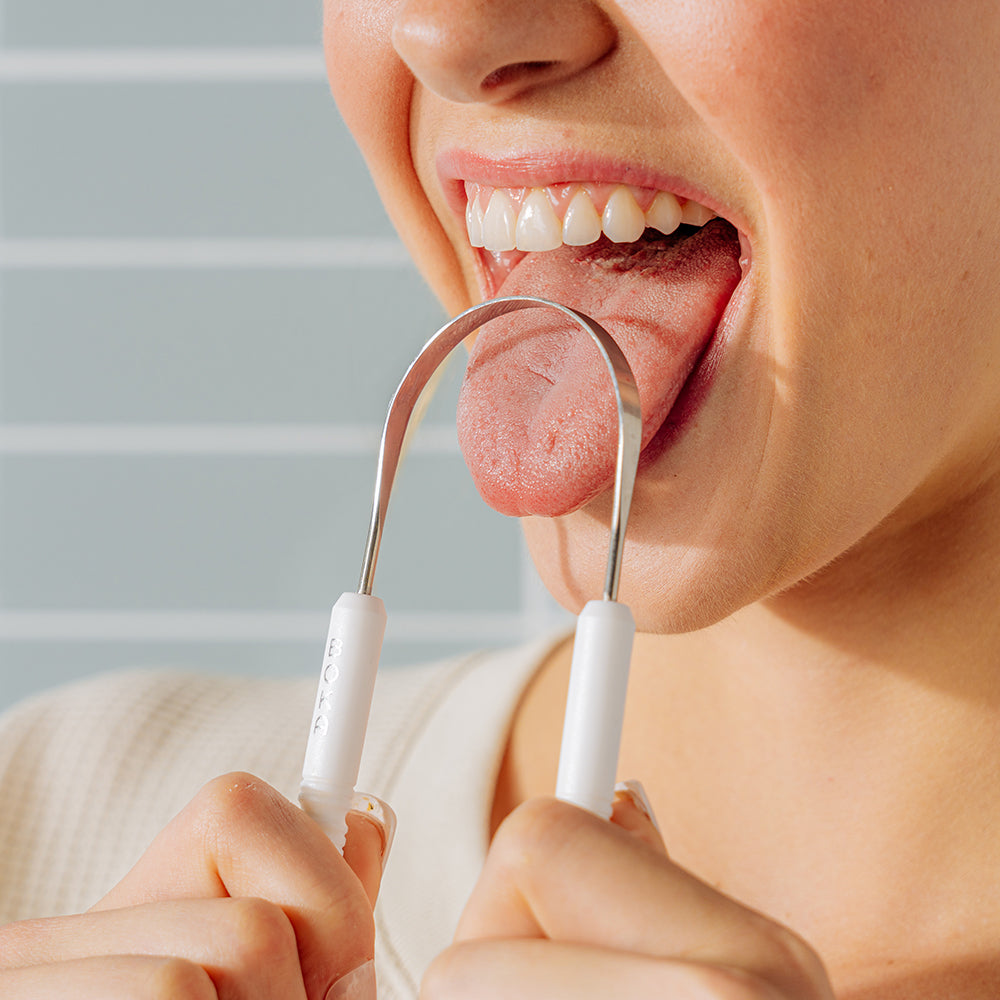 Brushing Your Tongue and Tongue Scraper to Avoid Bad Breath